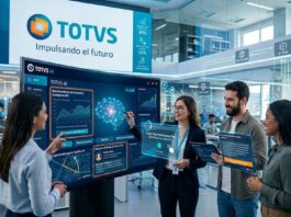TOTVS impulsa bases estratégicas para acelerar el éxito de la IA en América Latina Una imagen corporativa futurista de un equipo de TOTVS interactuando con paneles de datos y pantallas flotantes transparentes. En el centro, una pantalla grande de 'TOTVS AI' muestra gráficos e información sobre 'Recomendación de inventario Inteligente (RI)', 'TOTVS ERP' y 'Big Data'. Cuatro empleados usan dispositivos flotantes para visualizar planes de optimización de la cadena de suministro. Al fondo, un letrero de 'TOTVS' dice 'Impulsando el futuro' y muestra estadísticas de crecimiento. La escena está llena de símbolos tecnológicos y un brazo robótico en una mesa.